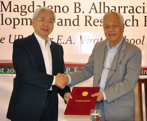 President Alfredo E. Pascual (left) and Regent Magdaleno B. Albarracin Jr.